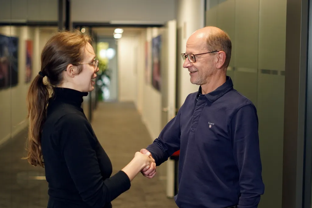 Professional handshake symbolizing partnership and collaboration