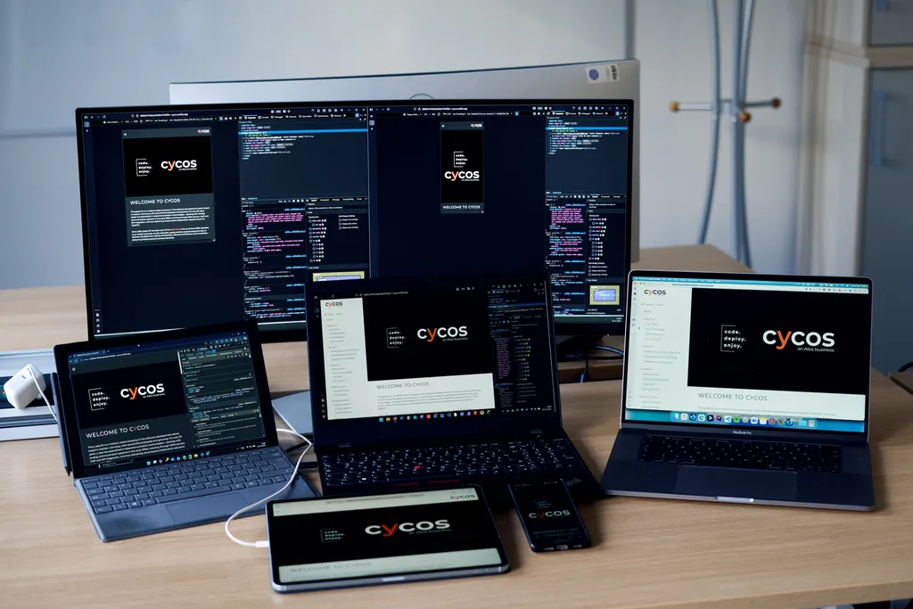 A variety of devices showing the cycos website in dark and light mode as well as multiple screen sizes